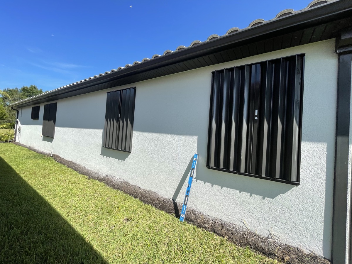 Accordion hurricane shutters open on SWFL home